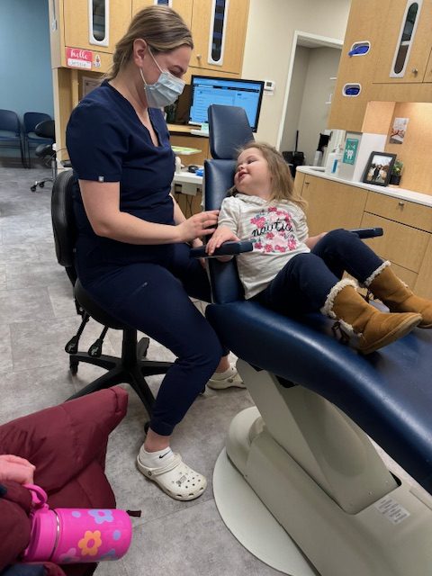 Hygienist with Patient